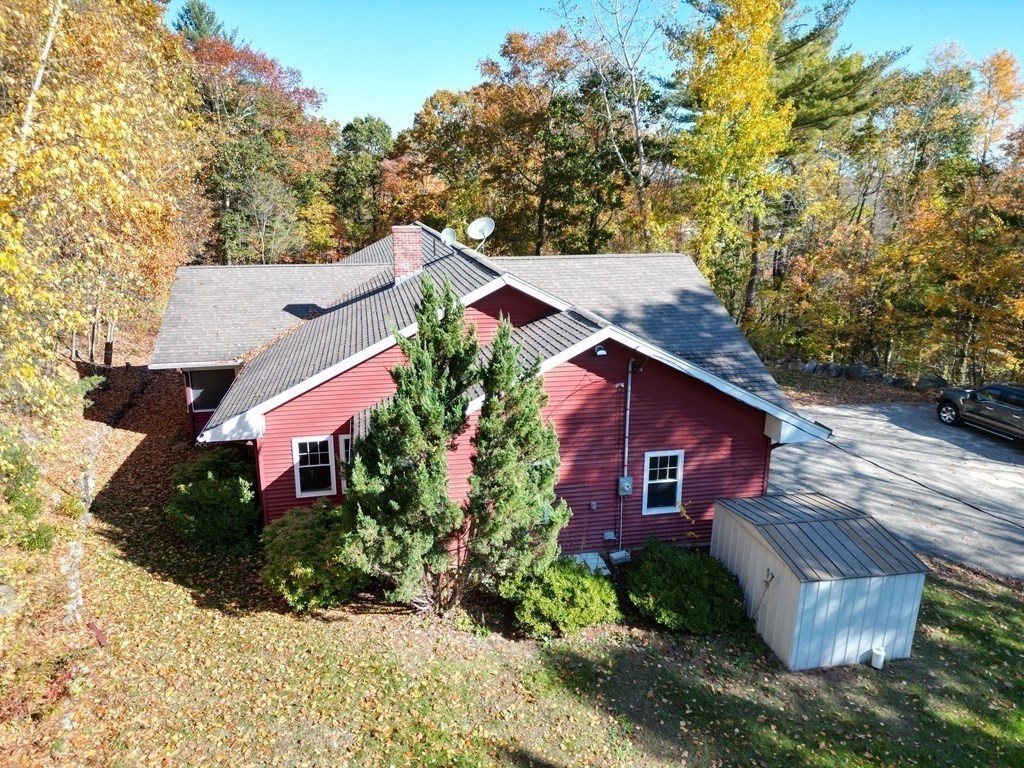 76 Davis Road New Braintree, MA 01531 - Photo 39 of 40 a front view of a house with garden