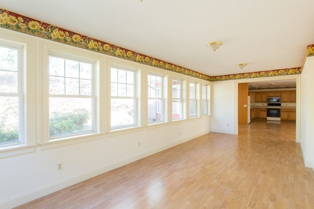76 Davis Road New Braintree, MA 01531 - Photo 6 of 40 a view of an empty room with window