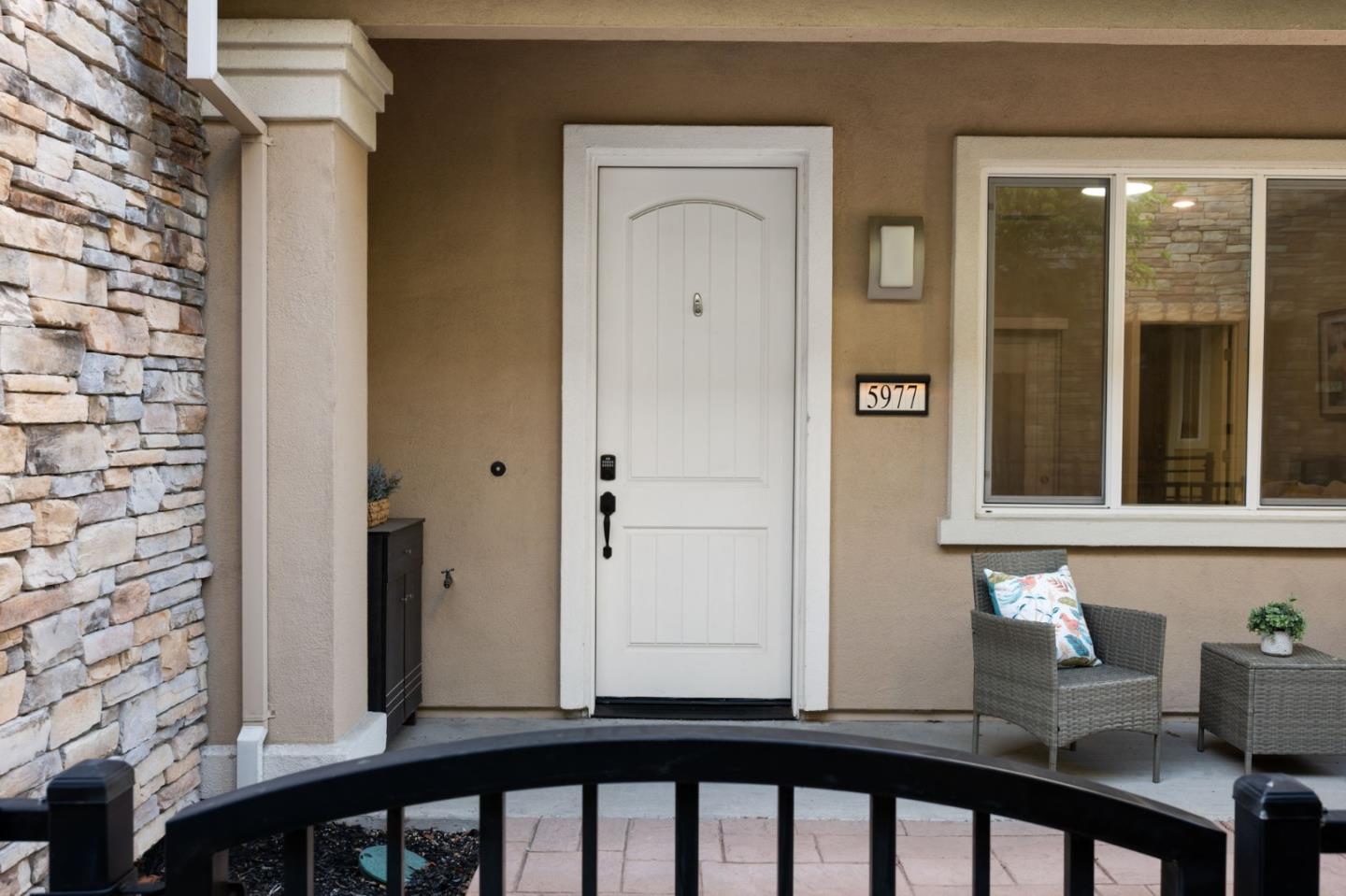 5977 Larkstone Loop San Jose, CA 95123 - Photo 3 of 63 a view of a balcony from a window