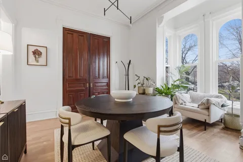 a view of a livingroom with furniture and a table