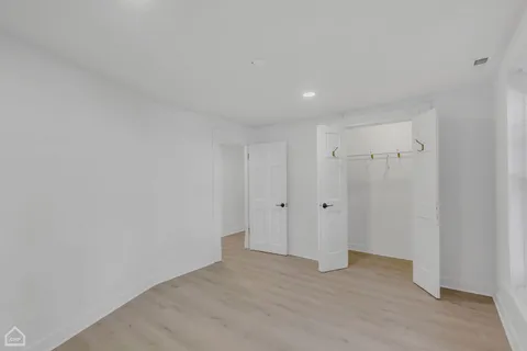 a view of a house with a snow in the yard