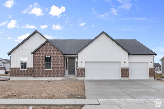 3322 West 2415 North Clinton, UT 84015 - Photo 1 of 1 Modern farmhouse featuring a garage