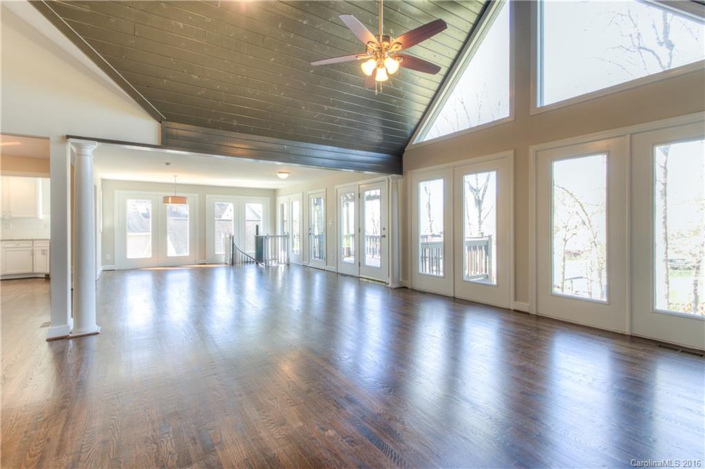 9827 Withers Road Charlotte, NC 28278 - Photo 2 of 24 a view of an entryway with wooden floor