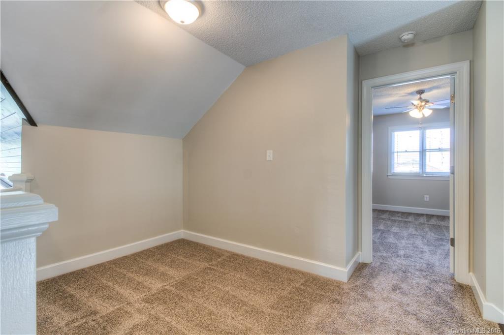 9827 Withers Road Charlotte, NC 28278 - Photo 13 of 24 an empty room with windows