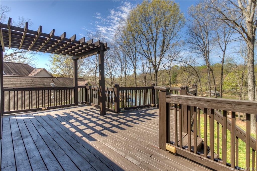 9827 Withers Road Charlotte, NC 28278 - Photo 20 of 24 a view of a wooden deck with a yard
