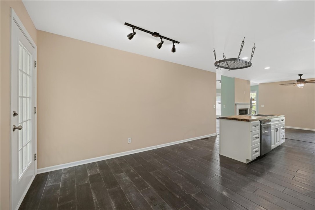 210 Briarcliff Road Central, SC 29630 - Photo 14 of 39 This inviting space features an open layout and rich wood-look flooring.