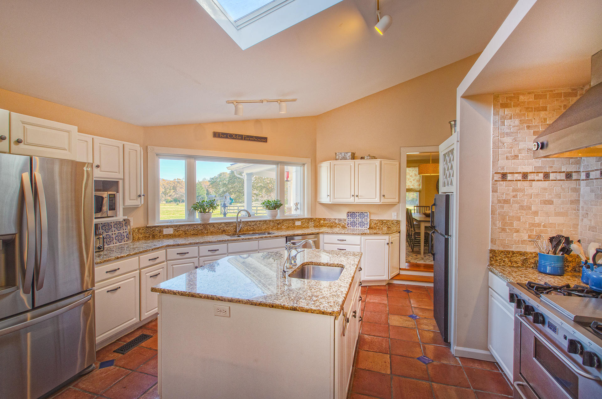 1413 Pollard Road Montvale, VA 24122 - Photo 31 of 68 a kitchen with stainless steel appliances granite countertop a refrigerator a stove and a sink
