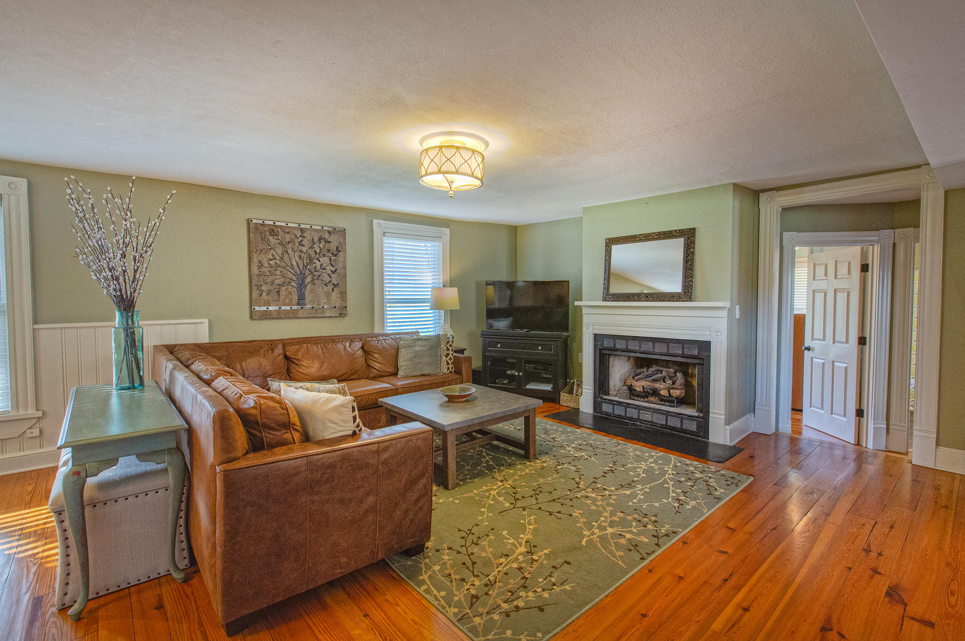 1413 Pollard Road Montvale, VA 24122 - Photo 36 of 68 a living room with furniture and a fireplace