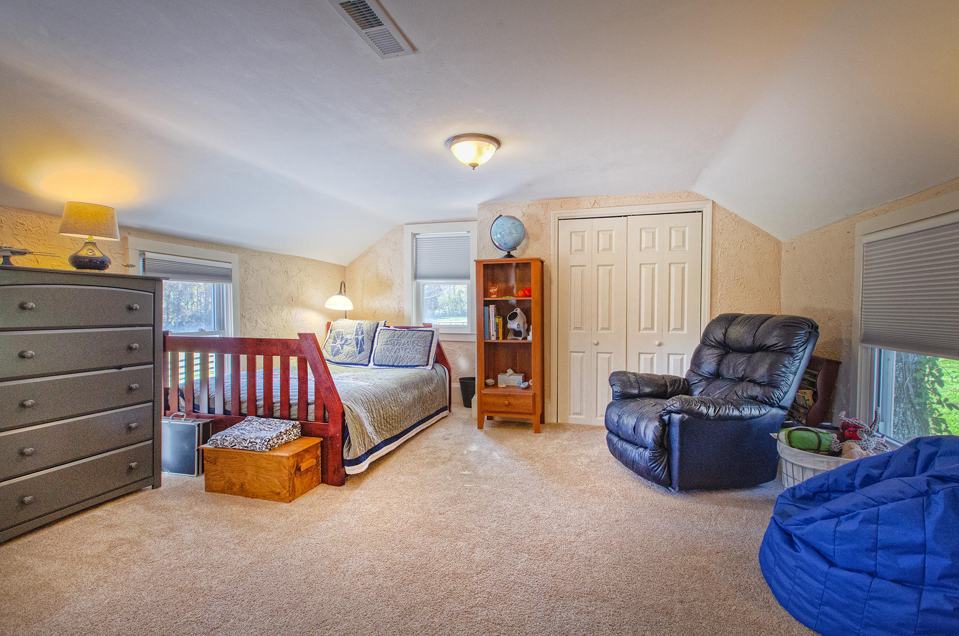 1413 Pollard Road Montvale, VA 24122 - Photo 41 of 68 a bedroom with furniture and a lamp