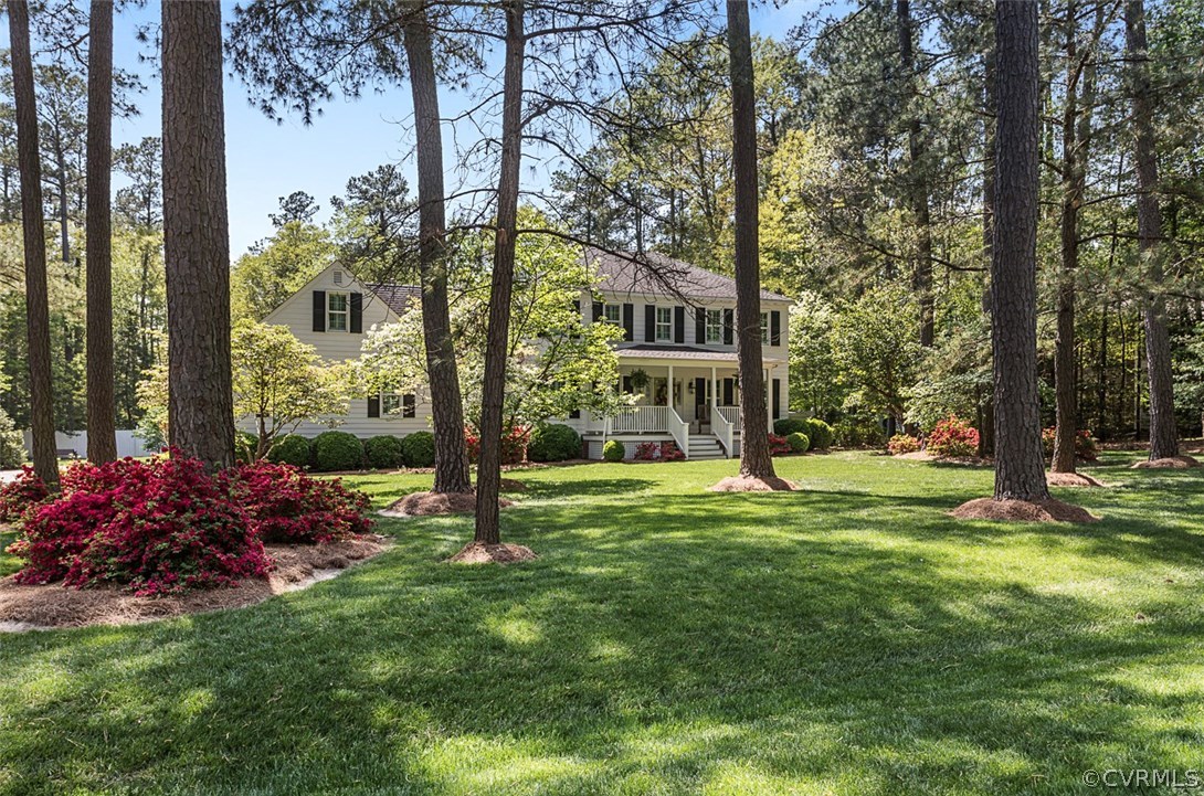 a view of a house with a garden
