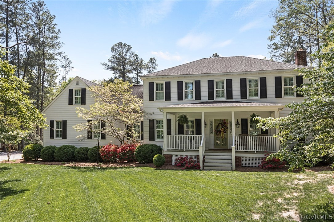 6611 Glebe Point Road Chesterfield, VA 23838 - Photo 2 of 44 a view of a house with a garden and plants