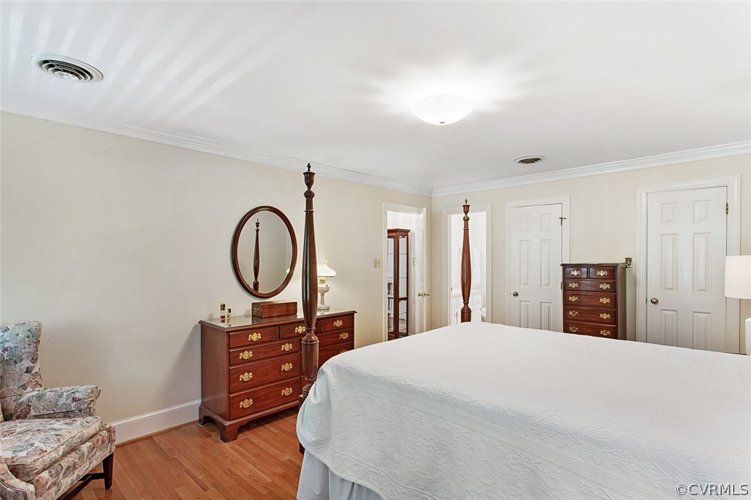 6611 Glebe Point Road Chesterfield, VA 23838 - Photo 23 of 44 a bedroom with a bed and a dresser