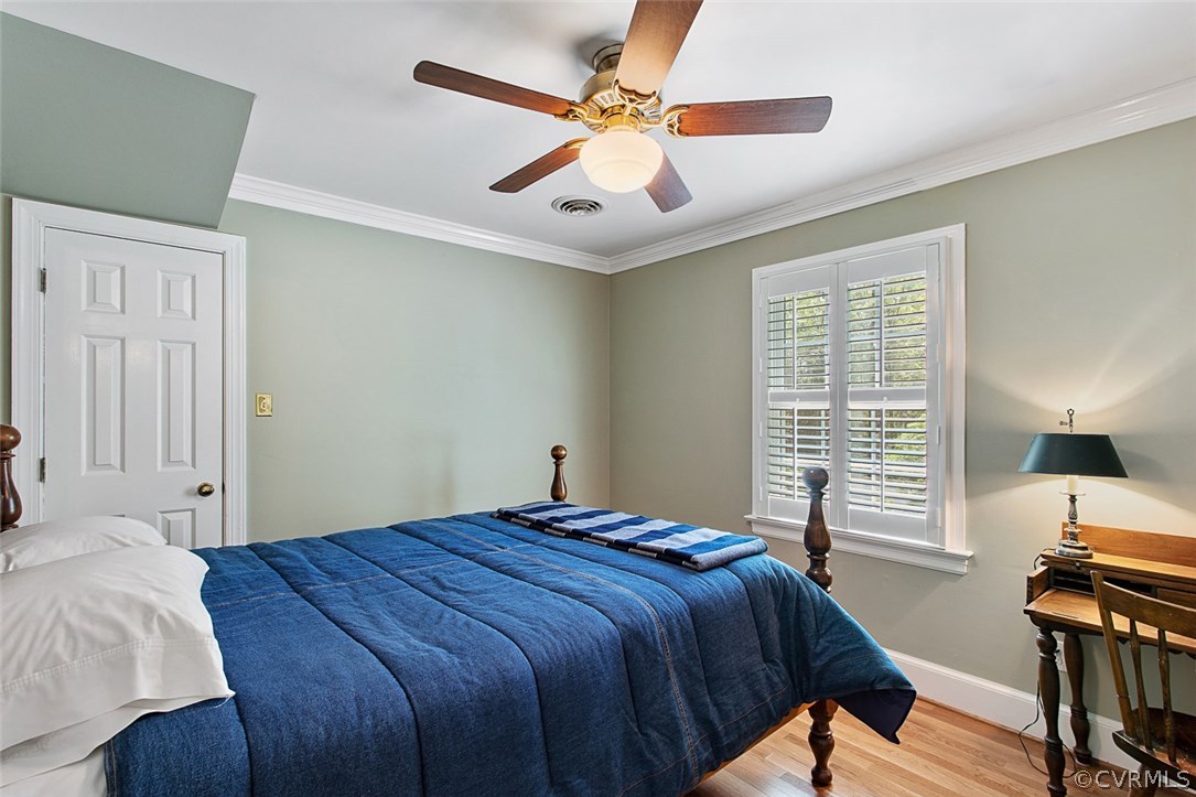 6611 Glebe Point Road Chesterfield, VA 23838 - Photo 27 of 44 a bedroom with a bed and a window
