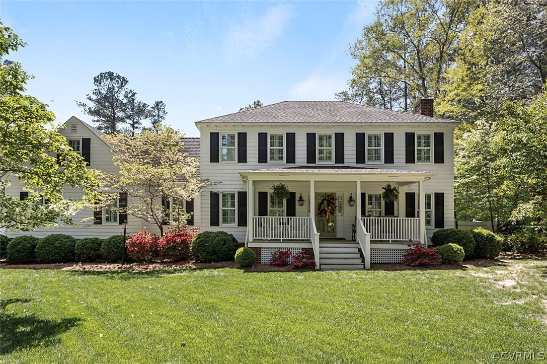 6611 Glebe Point Road Chesterfield, VA 23838 - Photo 3 of 44 a front view of a house with a garden