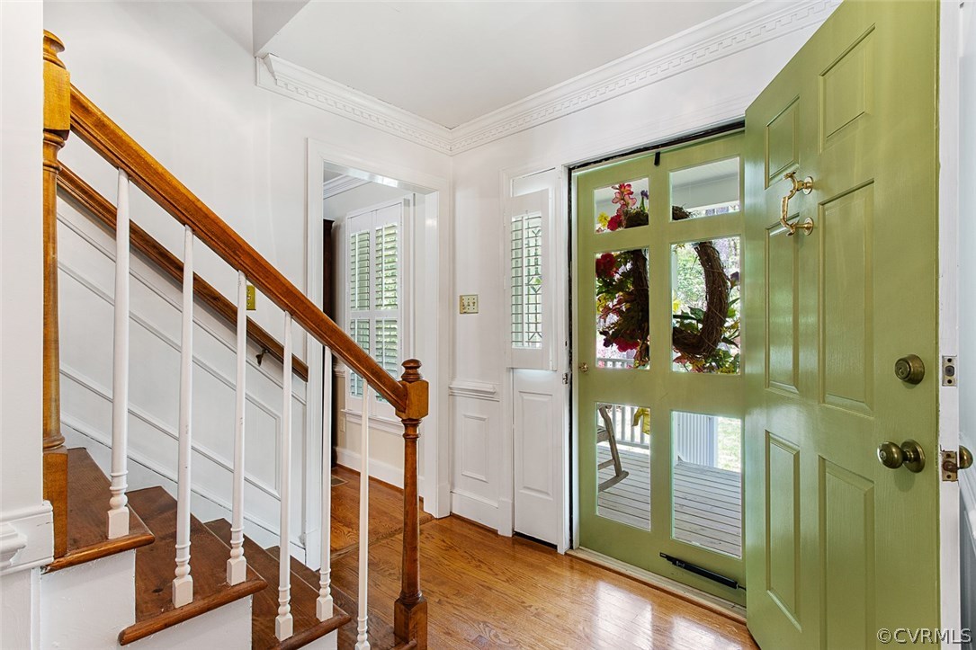 6611 Glebe Point Road Chesterfield, VA 23838 - Photo 7 of 44 a view of a hallway with wooden floor and staircase