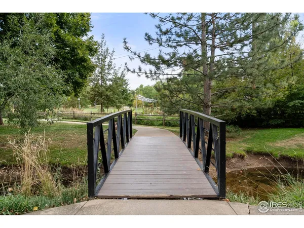 a balcony with wooden floor
