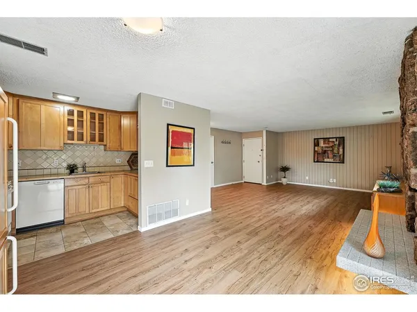 a view interior of a house a kitchen and wooden floor
