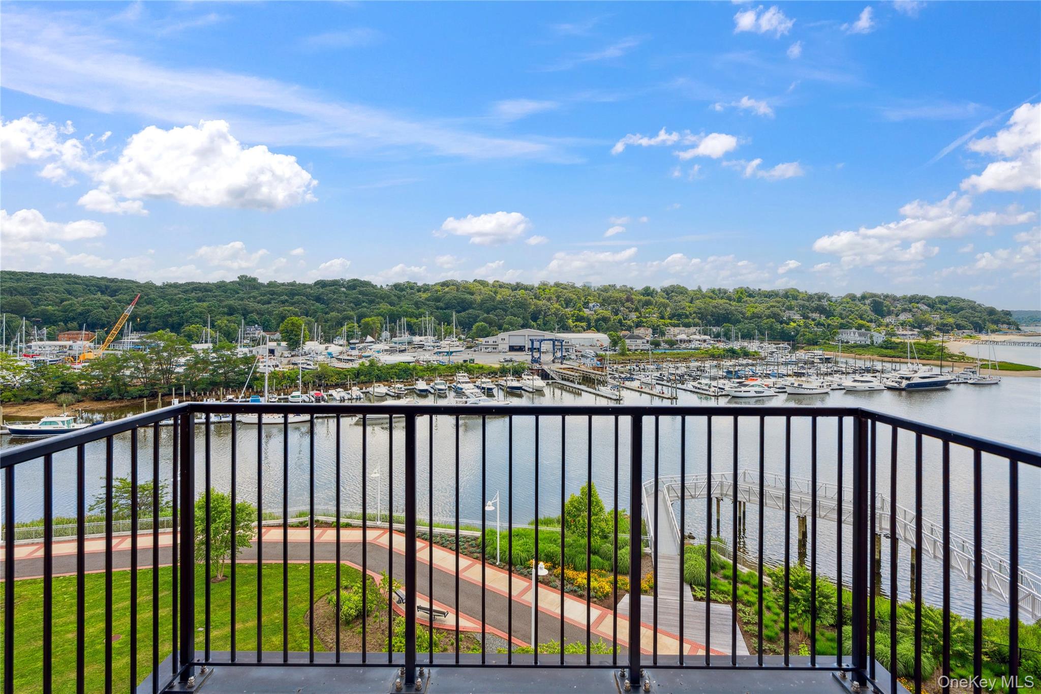 100 Garvies Point Road, Unit 1304 Glen Cove, NY 11542 - Photo 16 of 34 Balcony with view of marina and a water view