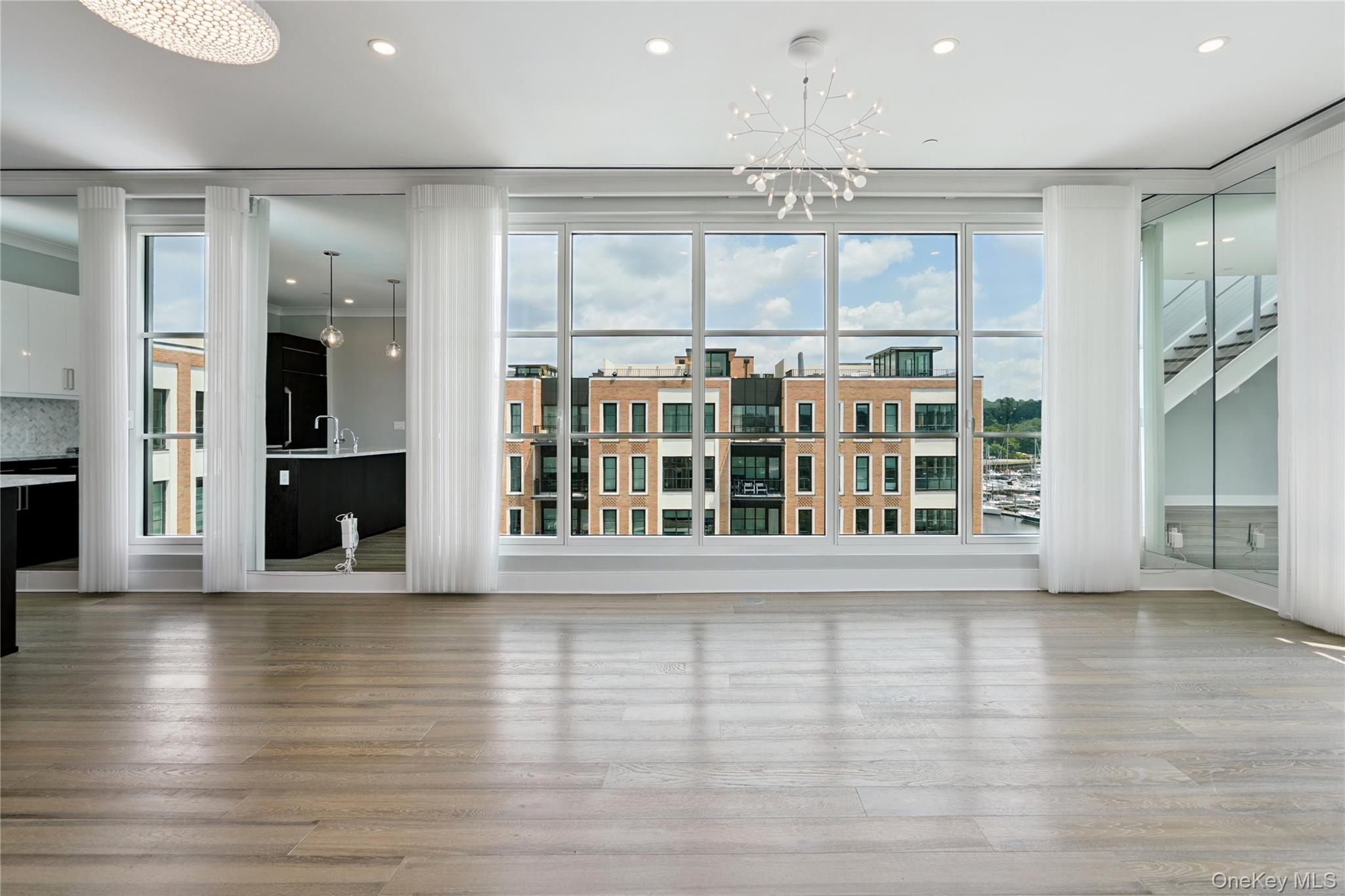 100 Garvies Point Road, Unit 1304 Glen Cove, NY 11542 - Photo 2 of 34 Living room