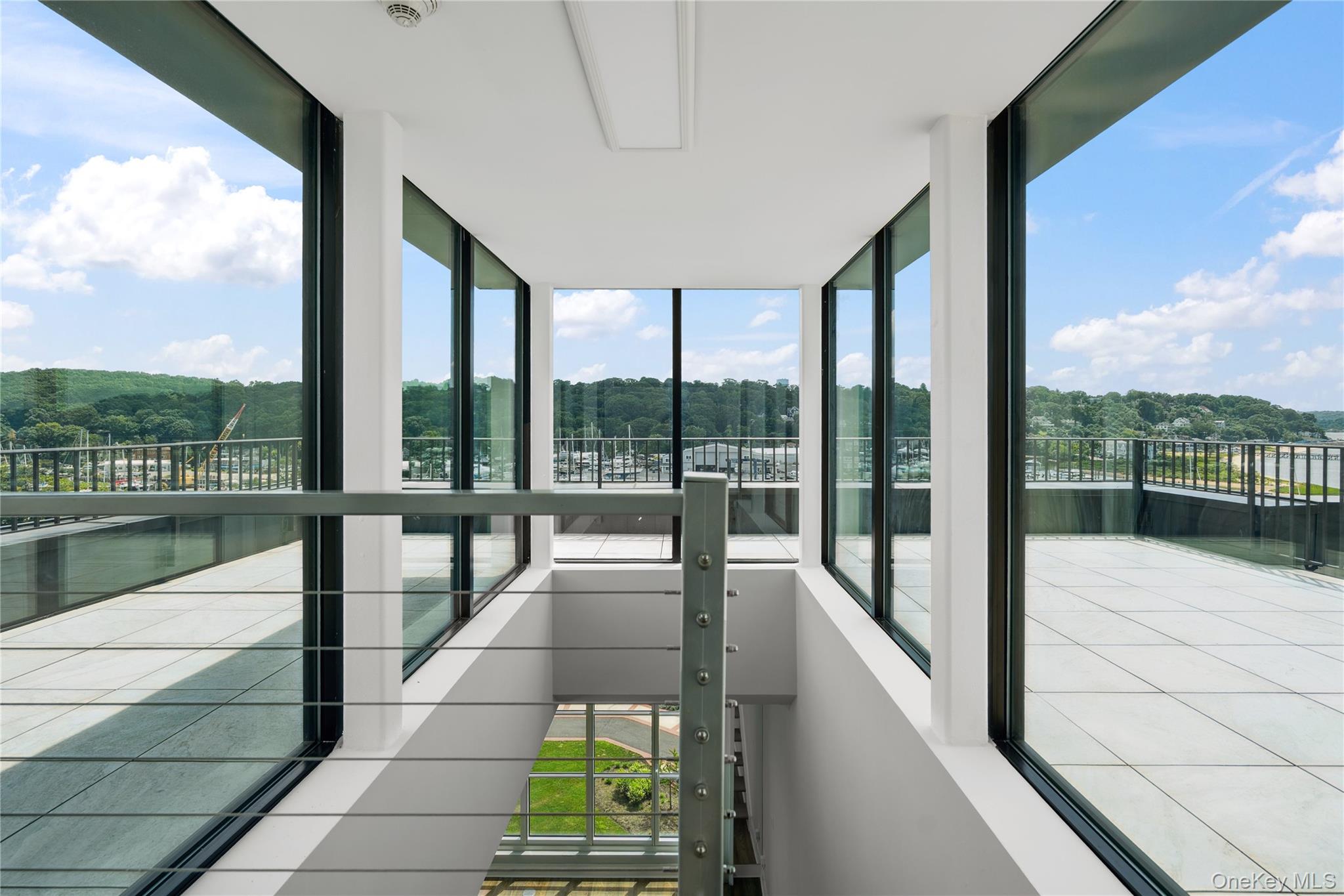 100 Garvies Point Road, Unit 1304 Glen Cove, NY 11542 - Photo 21 of 34 Landing leading to rooftop terrace