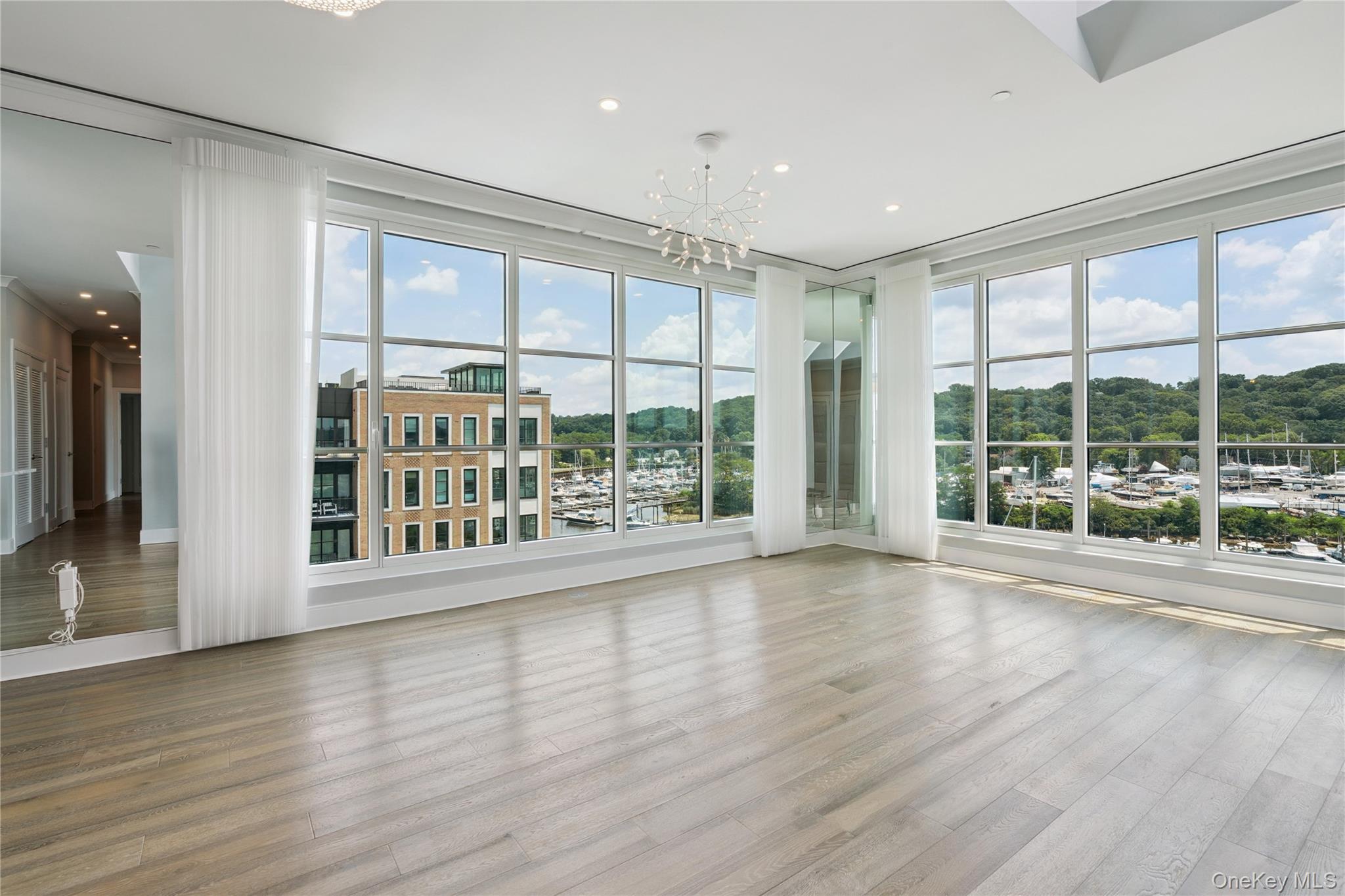 100 Garvies Point Road, Unit 1304 Glen Cove, NY 11542 - Photo 5 of 34 Living room