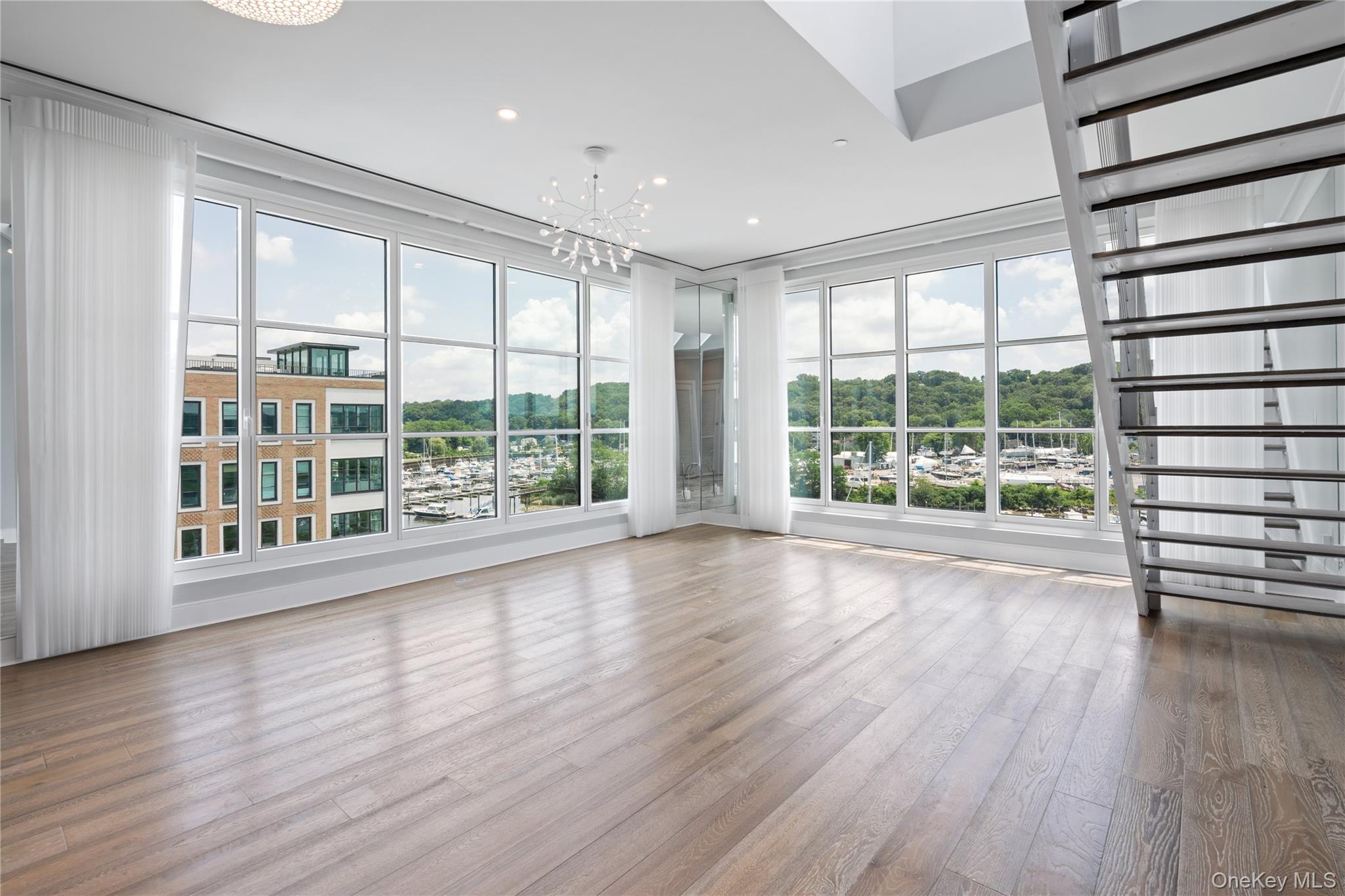 100 Garvies Point Road, Unit 1304 Glen Cove, NY 11542 - Photo 6 of 34 Living room