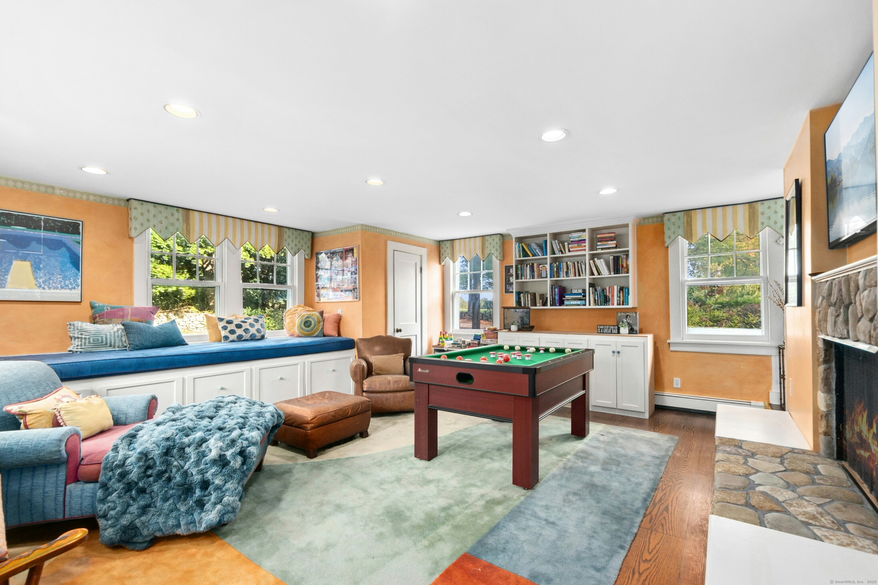 561 Middlesex Road Darien, CT 06820 - Photo 20 of 33 a living room with furniture and a large window