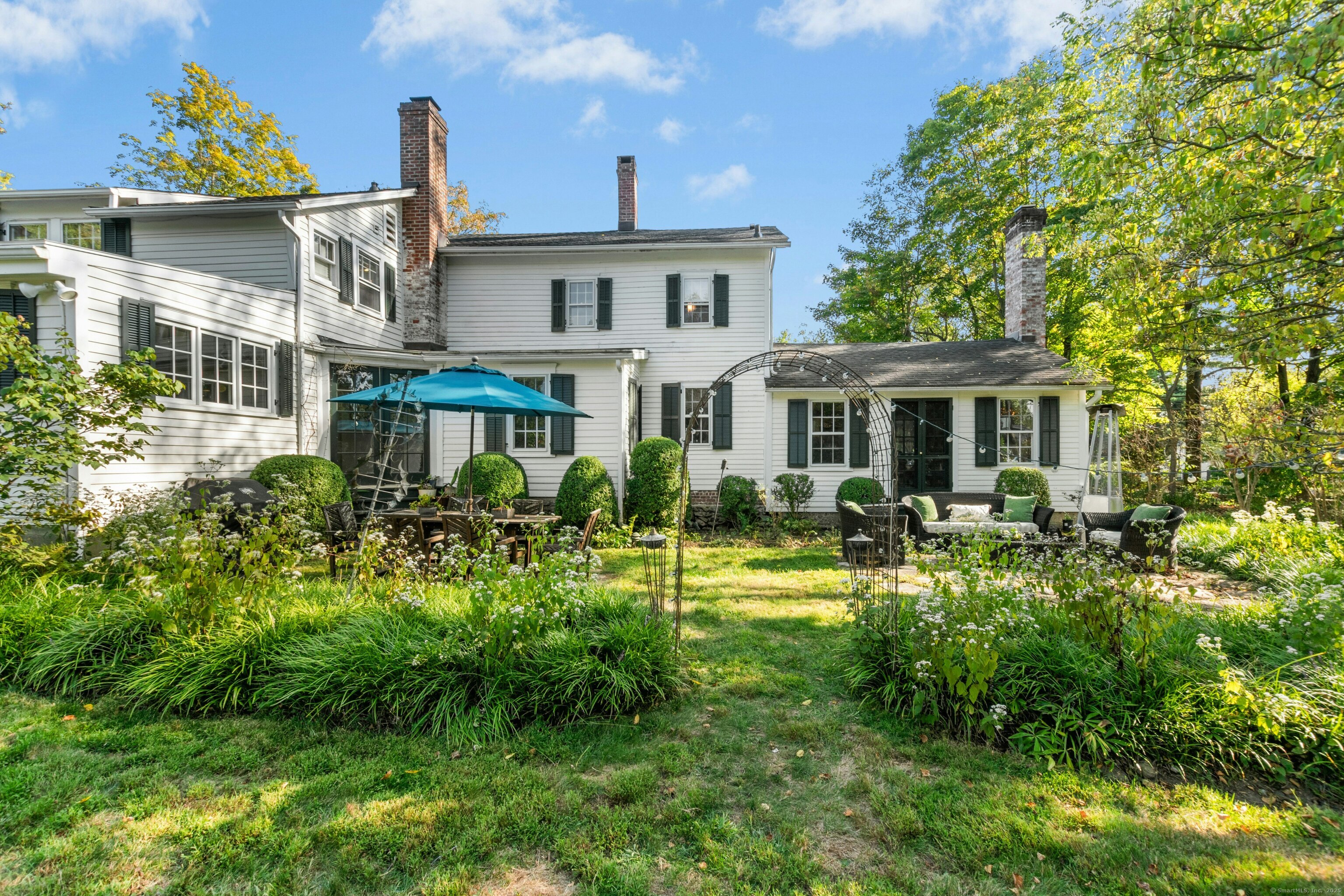 561 Middlesex Road Darien, CT 06820 - Photo 27 of 33 a house view with a garden space