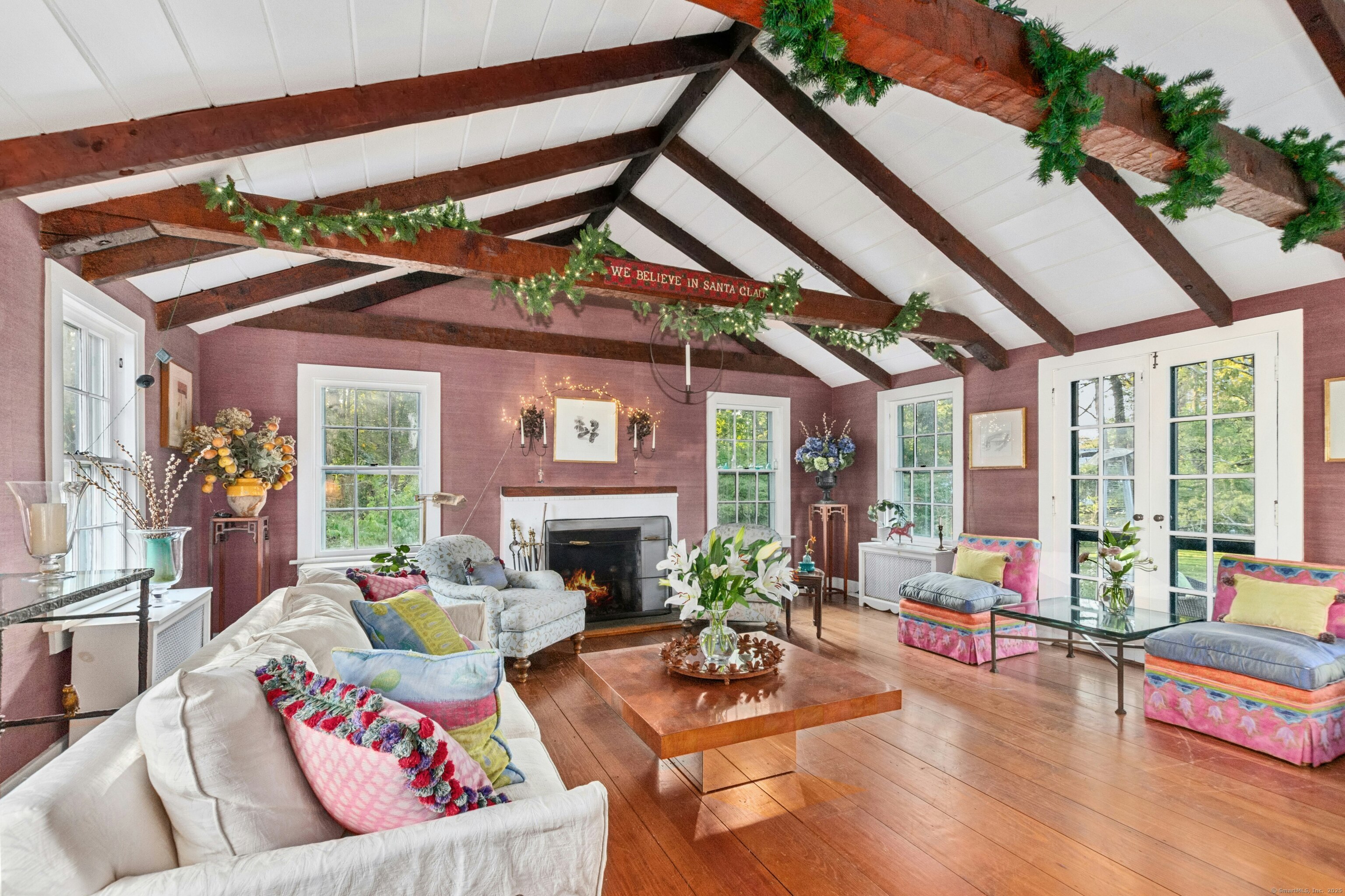 561 Middlesex Road Darien, CT 06820 - Photo 8 of 33 a living room with furniture and a floor to ceiling window