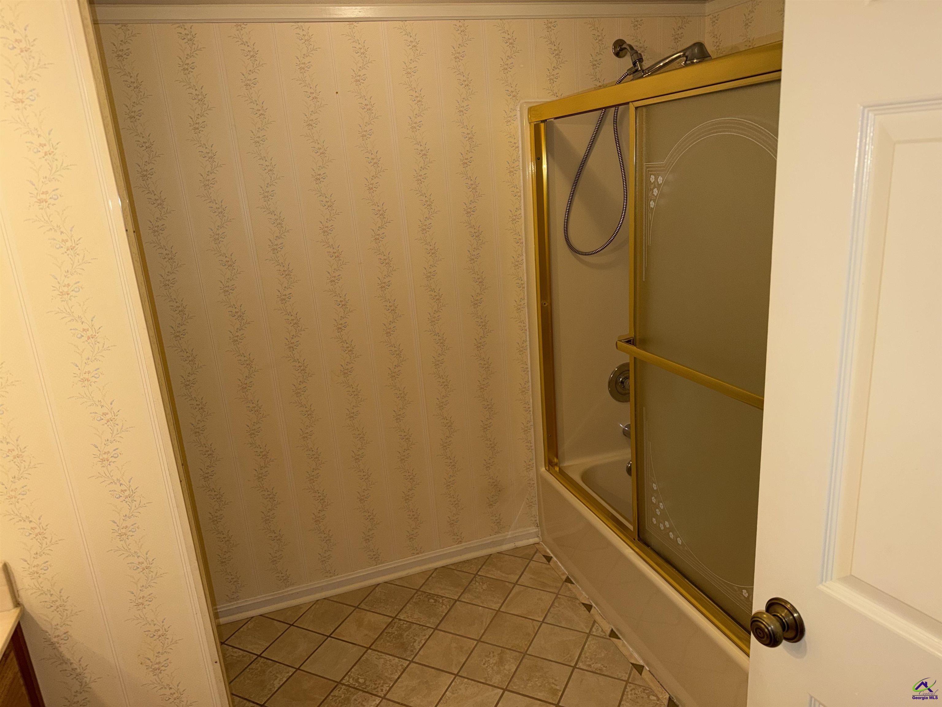 249 Hatcher Road Warner Robins, GA 31088 - Photo 22 of 25 a bathroom with a shower