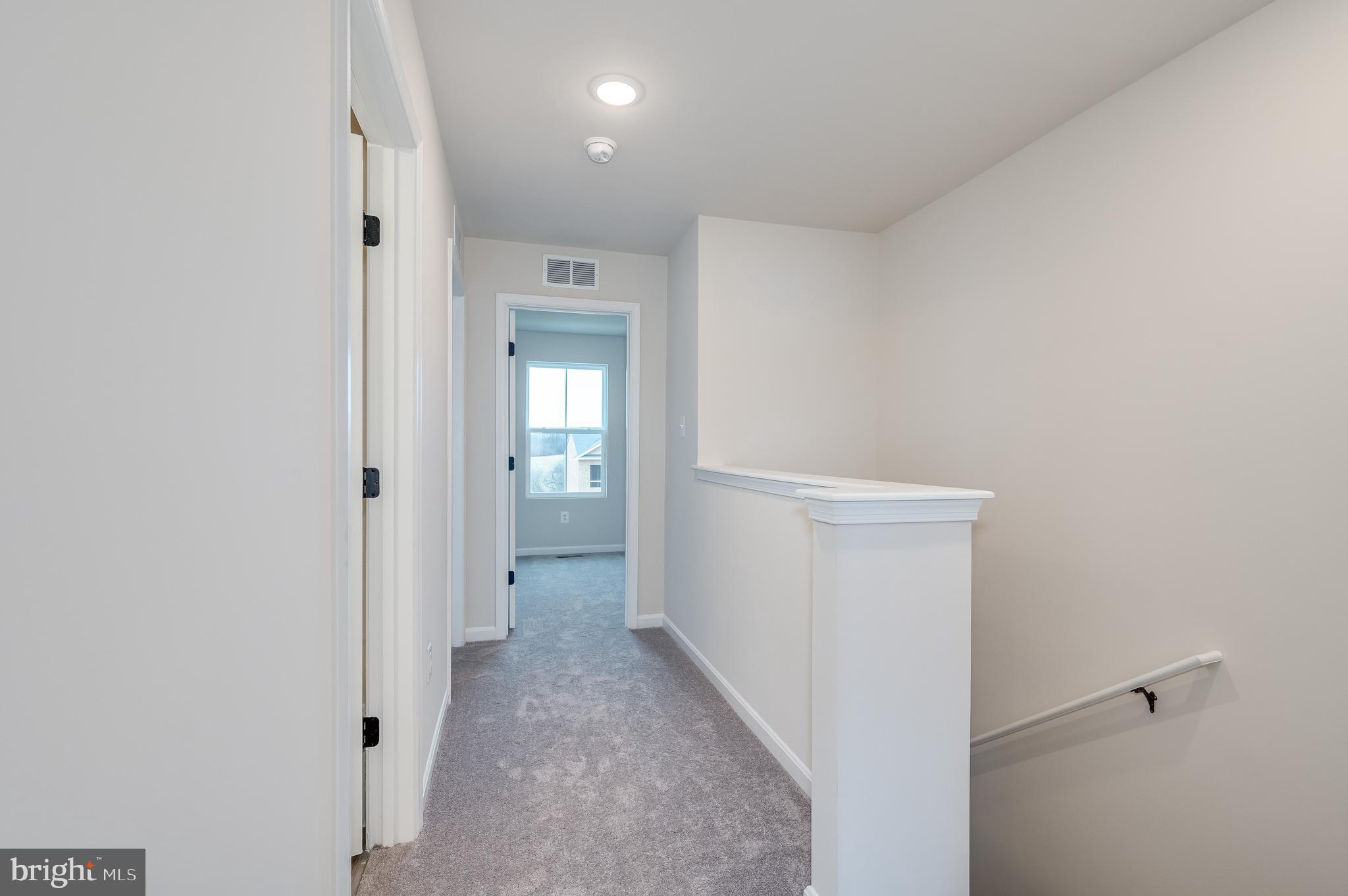 164 Rabbit Road Hedgesville, WV 25427 - Photo 28 of 42 a view of a hallway with a white walls