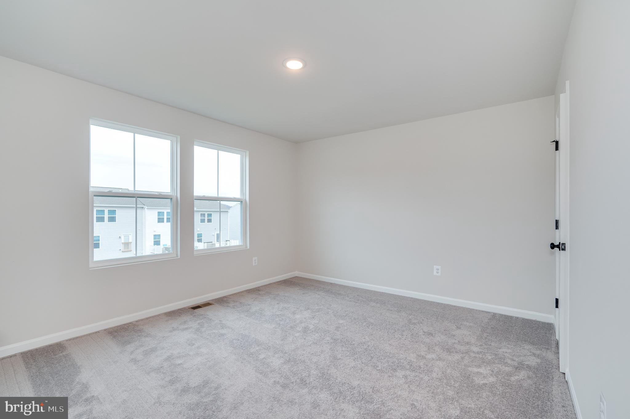 164 Rabbit Road Hedgesville, WV 25427 - Photo 30 of 42 an empty room with a window