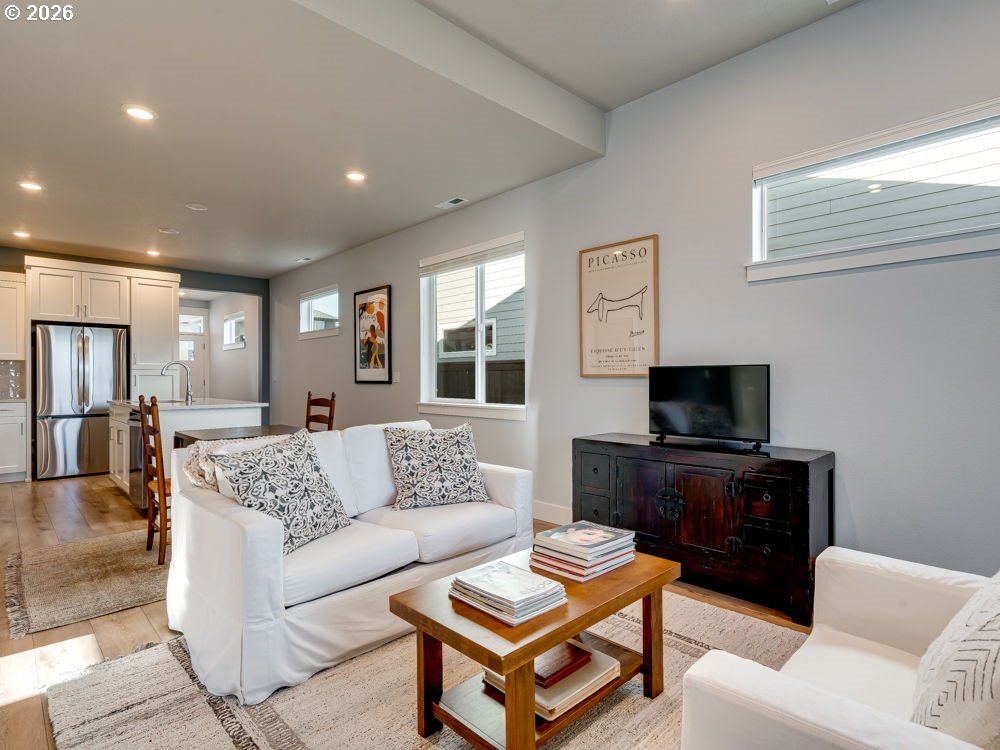 1608 South Fern Way Canby, OR 97013 - Photo 20 of 39 a living room with furniture and a flat screen tv