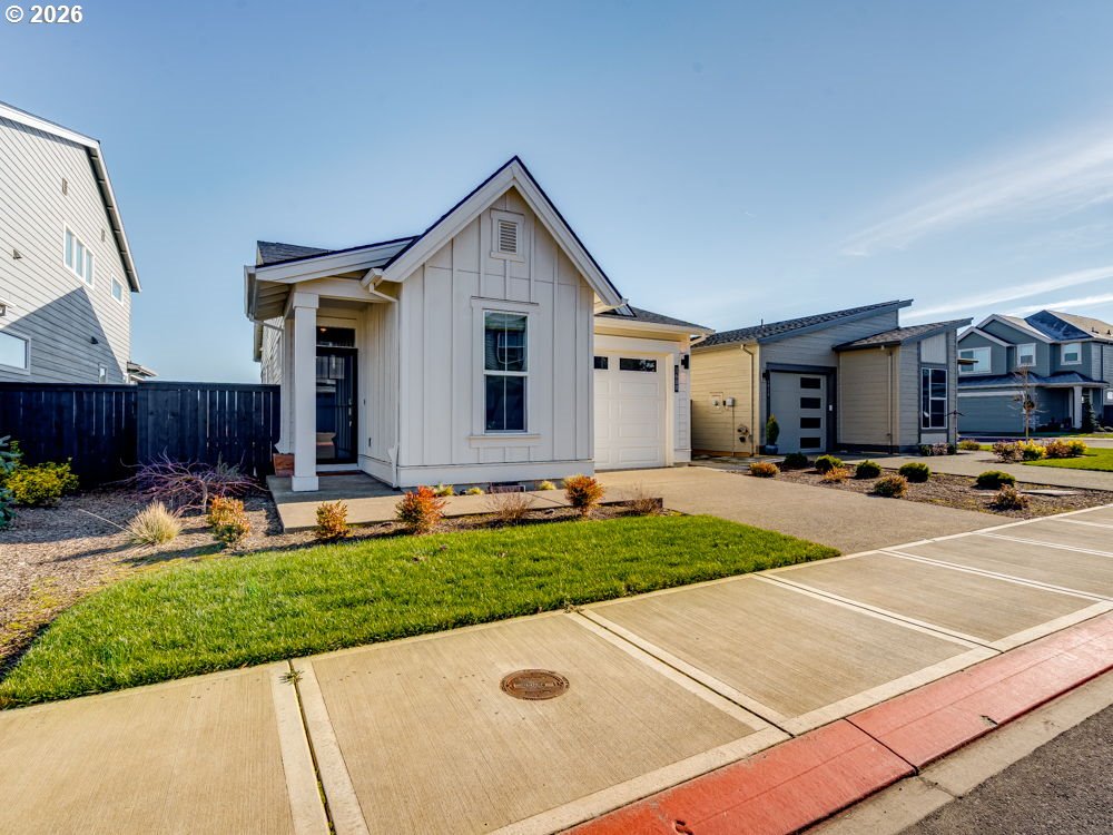 1608 South Fern Way Canby, OR 97013 - Photo 3 of 39 front view of a house with a yard