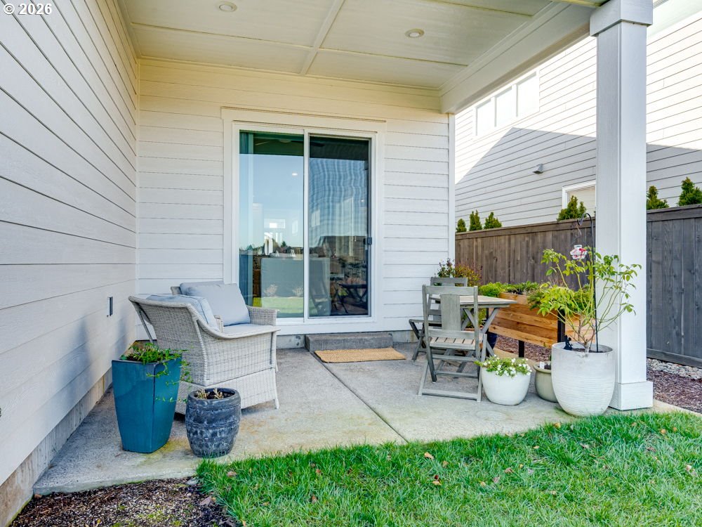 1608 South Fern Way Canby, OR 97013 - Photo 37 of 39 a view of a chair and tables in the patio