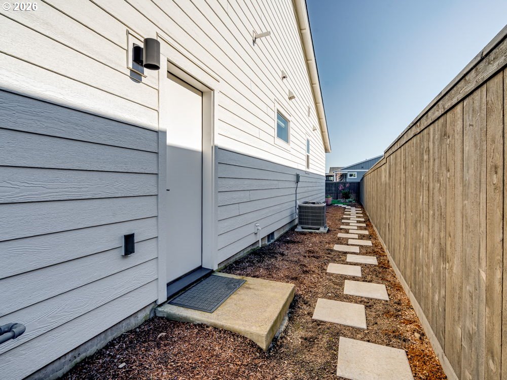 1608 South Fern Way Canby, OR 97013 - Photo 7 of 39 a view of stairs and back yard of a house