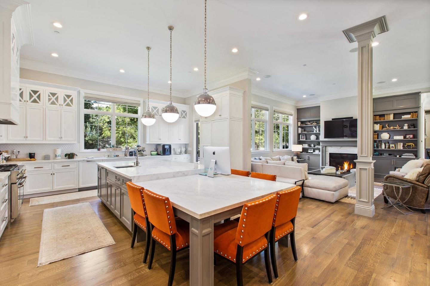 250 Bridge Road Hillsborough, CA 94010 - Photo 18 of 80 a large kitchen with a table and chairs