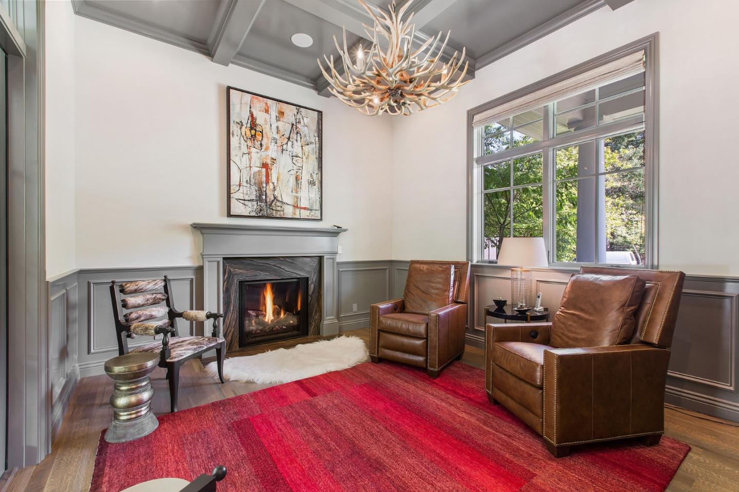 250 Bridge Road Hillsborough, CA 94010 - Photo 23 of 80 a living room with furniture and a fireplace