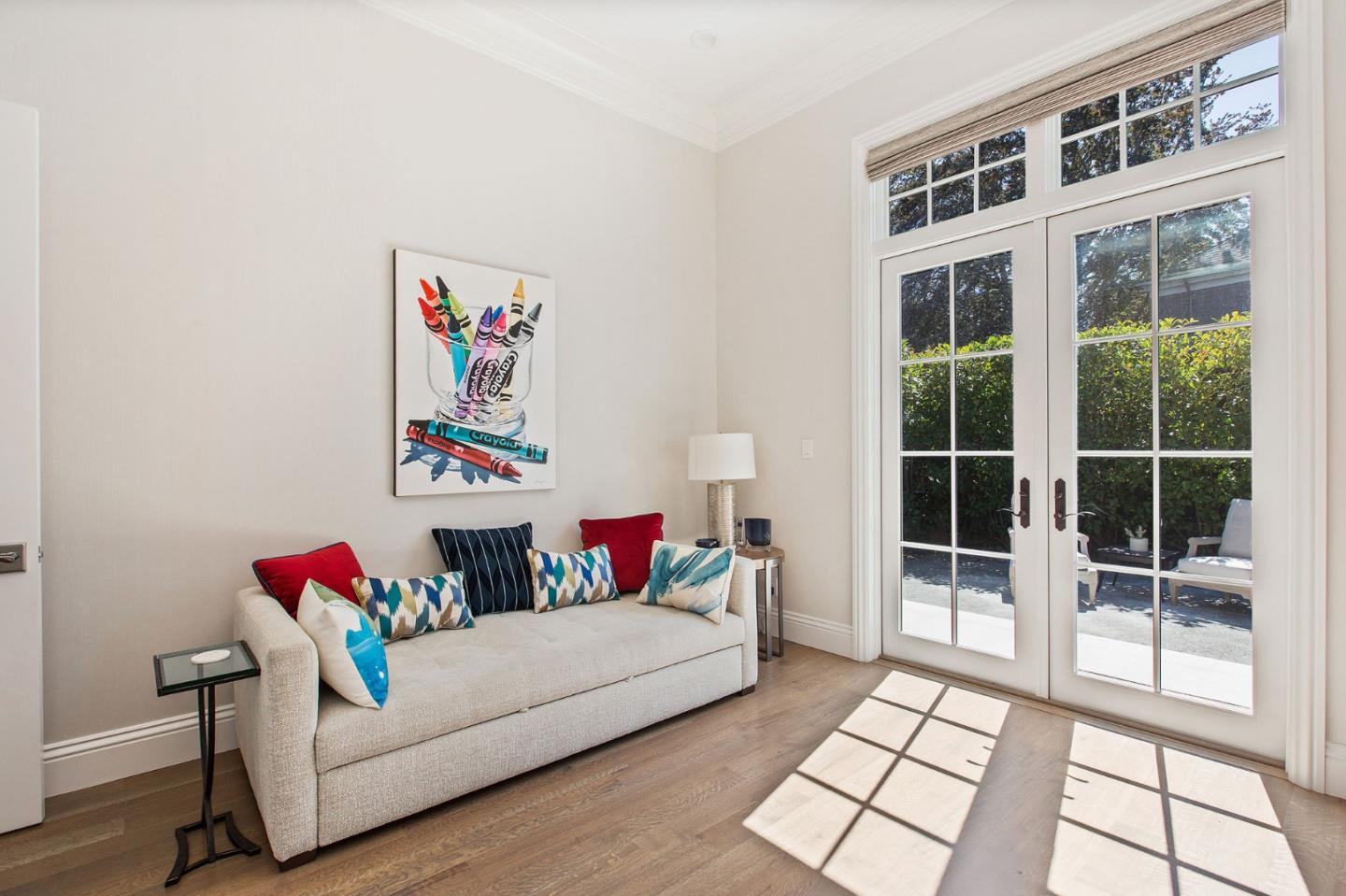 250 Bridge Road Hillsborough, CA 94010 - Photo 25 of 80 a living room with furniture and a floor to ceiling window