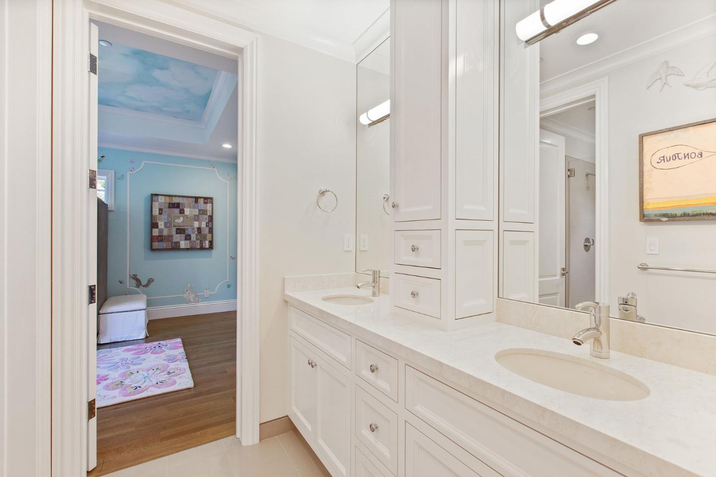 250 Bridge Road Hillsborough, CA 94010 - Photo 38 of 80 a spacious bathroom with a double vanity sink and a mirror