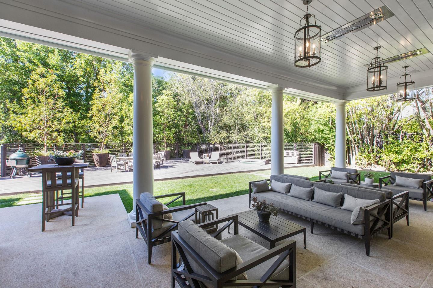 250 Bridge Road Hillsborough, CA 94010 - Photo 59 of 80 a living room with furniture and a floor to ceiling window