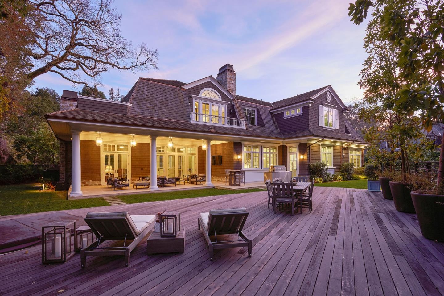 250 Bridge Road Hillsborough, CA 94010 - Photo 79 of 80 a view of a chairs and table on the deck in front of house