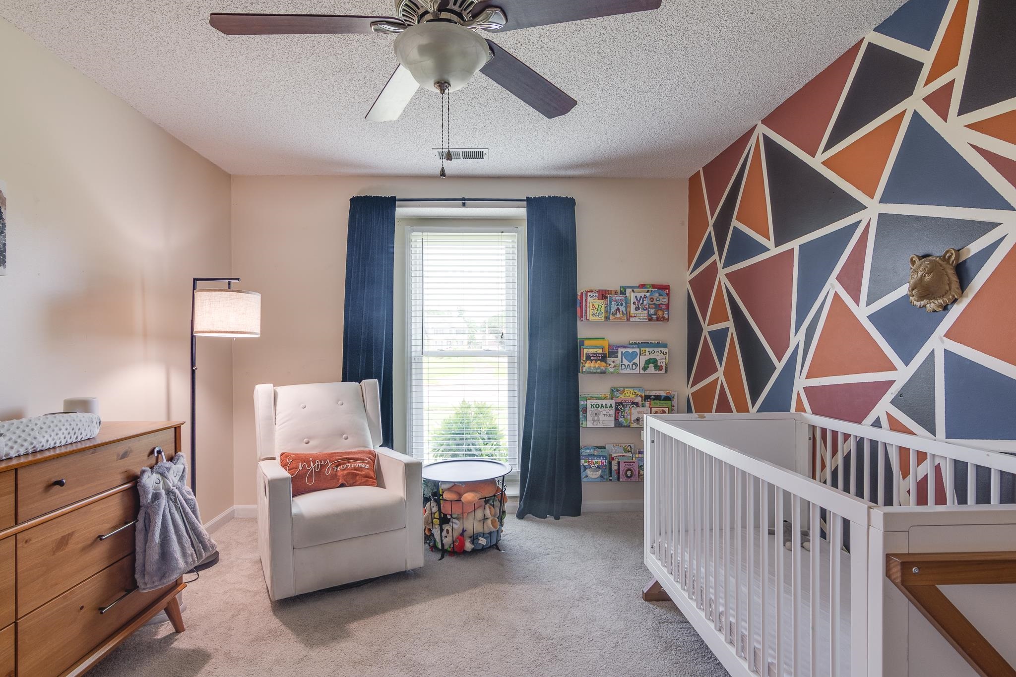 8703 Old River Road Memphis, TN 38018 - Photo 22 of 31 Carpeted bedroom featuring a textured ceiling and a ceiling fan