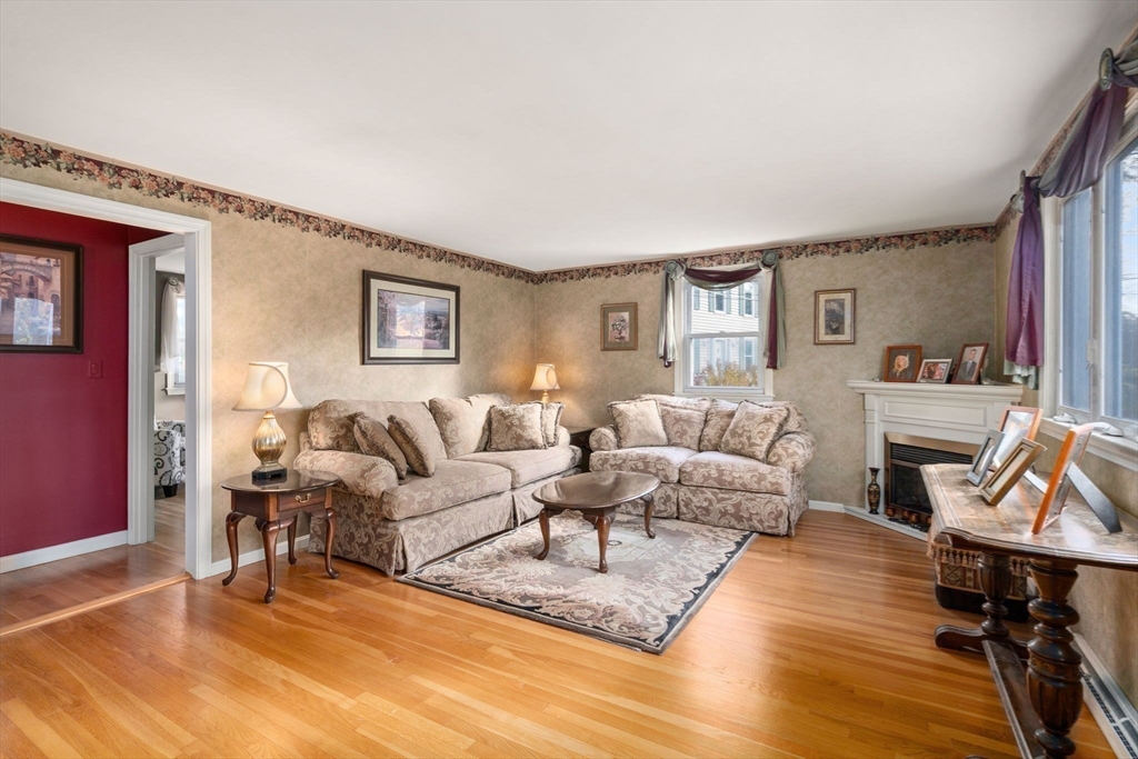 102 Montgomery Avenue Lowell, MA 01851 - Photo 16 of 40 a living room with furniture