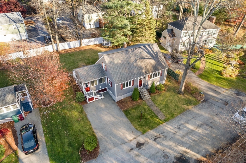 102 Montgomery Avenue Lowell, MA 01851 - Photo 2 of 40 an aerial view of a house with a yard