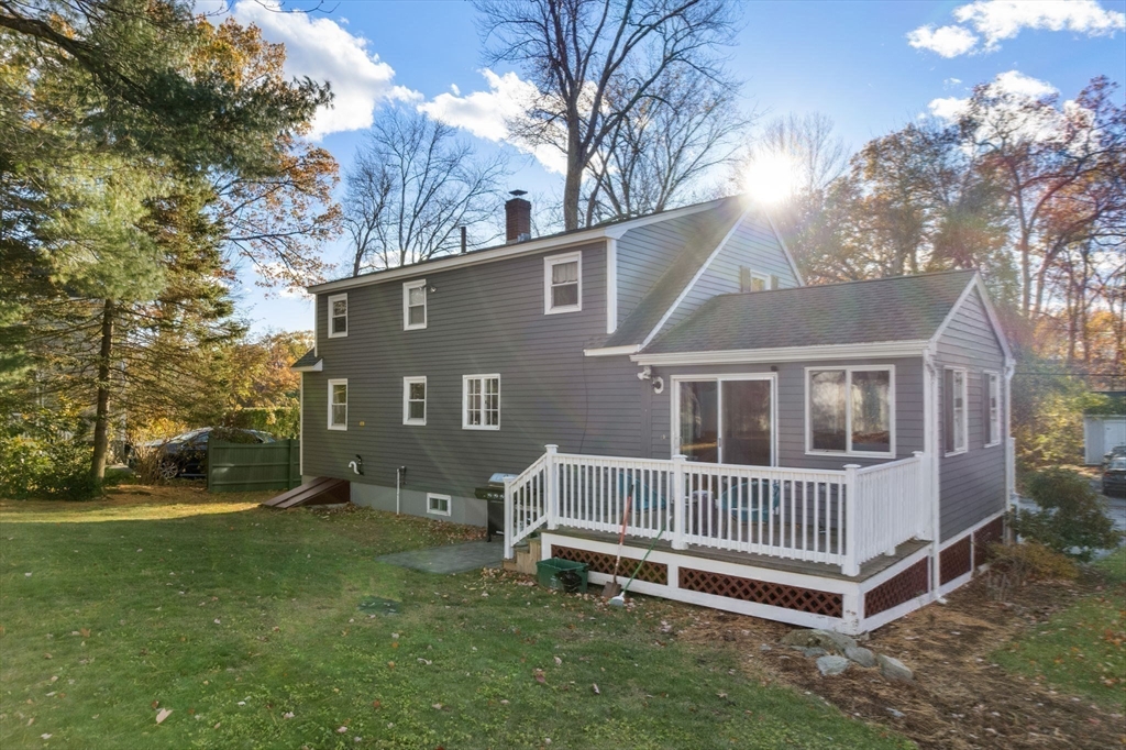 102 Montgomery Avenue Lowell, MA 01851 - Photo 29 of 40 a view of a house with a yard and deck