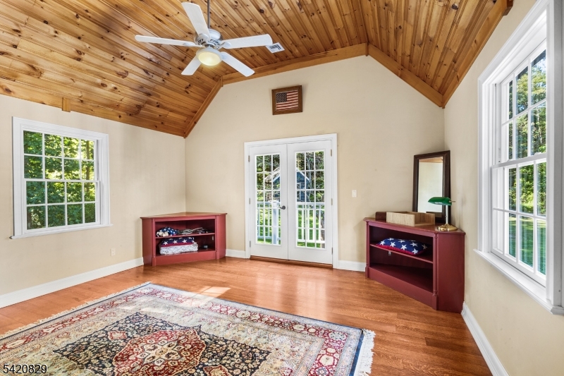 3 Laurel Lane Chester, NJ 07930 - Photo 12 of 37 a living room with furniture and a fireplace
