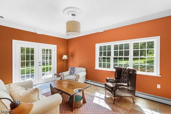 a room with furniture and window