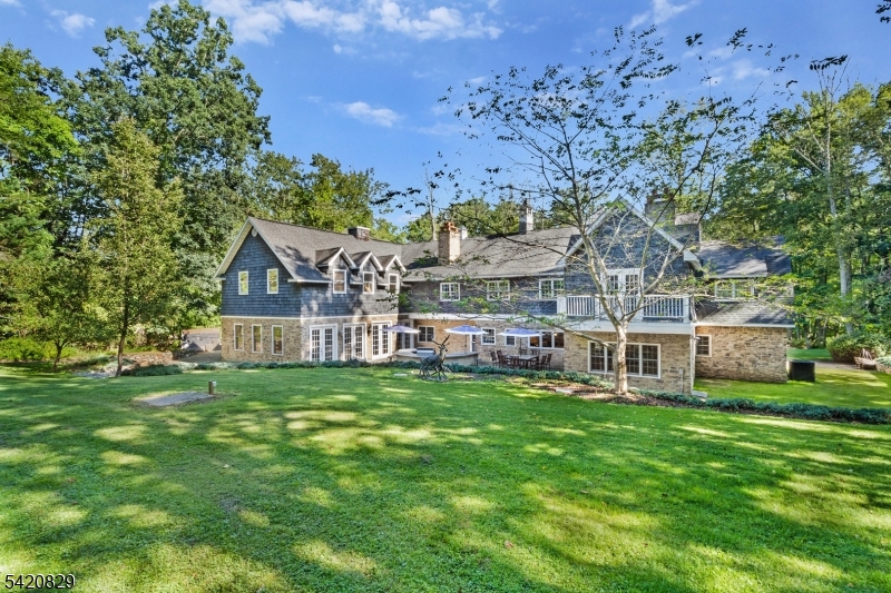 3 Laurel Lane Chester, NJ 07930 - Photo 2 of 37 a view of a house with a big yard and large trees