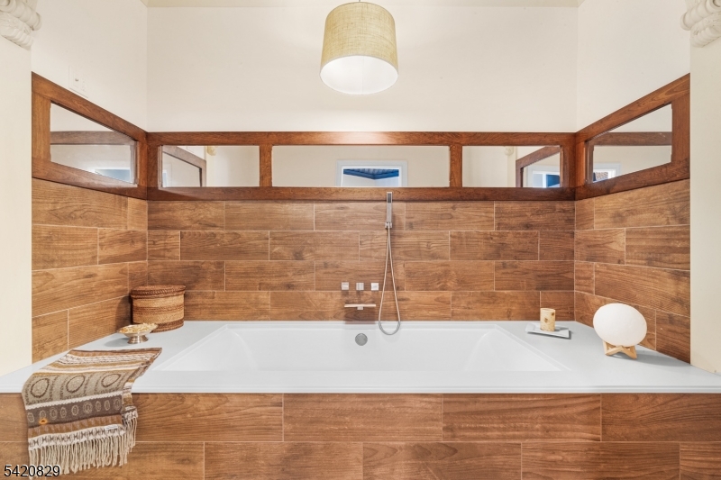 3 Laurel Lane Chester, NJ 07930 - Photo 22 of 37 a bathroom with a granite countertop bathtub and sink